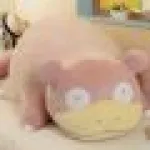 Life-sized Slowpoke on bed