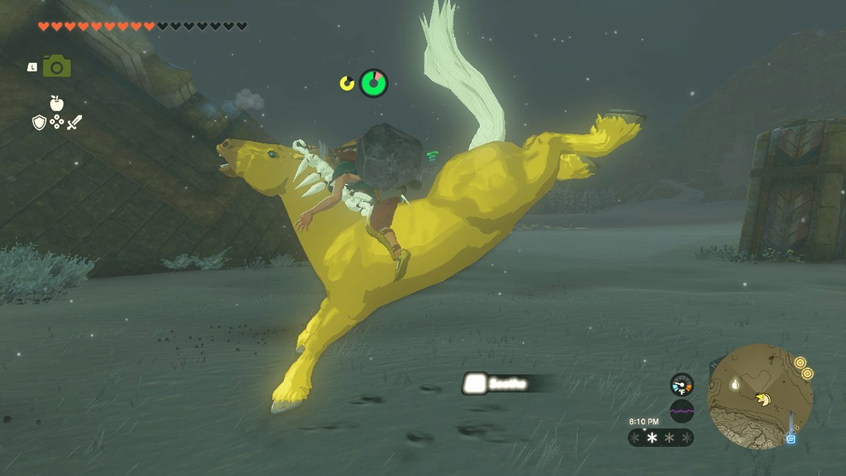 A screenshot of Link taming Zelda golden horse in Tears of the Kingdom.