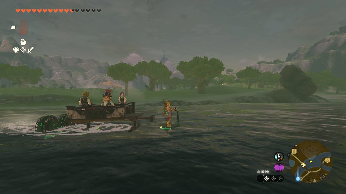 A screenshot of Link riding a boat in Tears of the Kingdom.