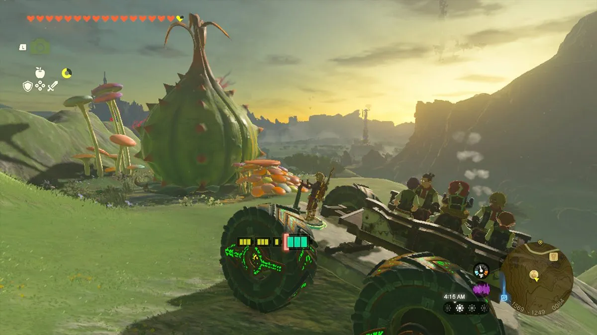 A screenshot of Link riding a big wheel vehicle up a mountain in Tears of the Kingdom.