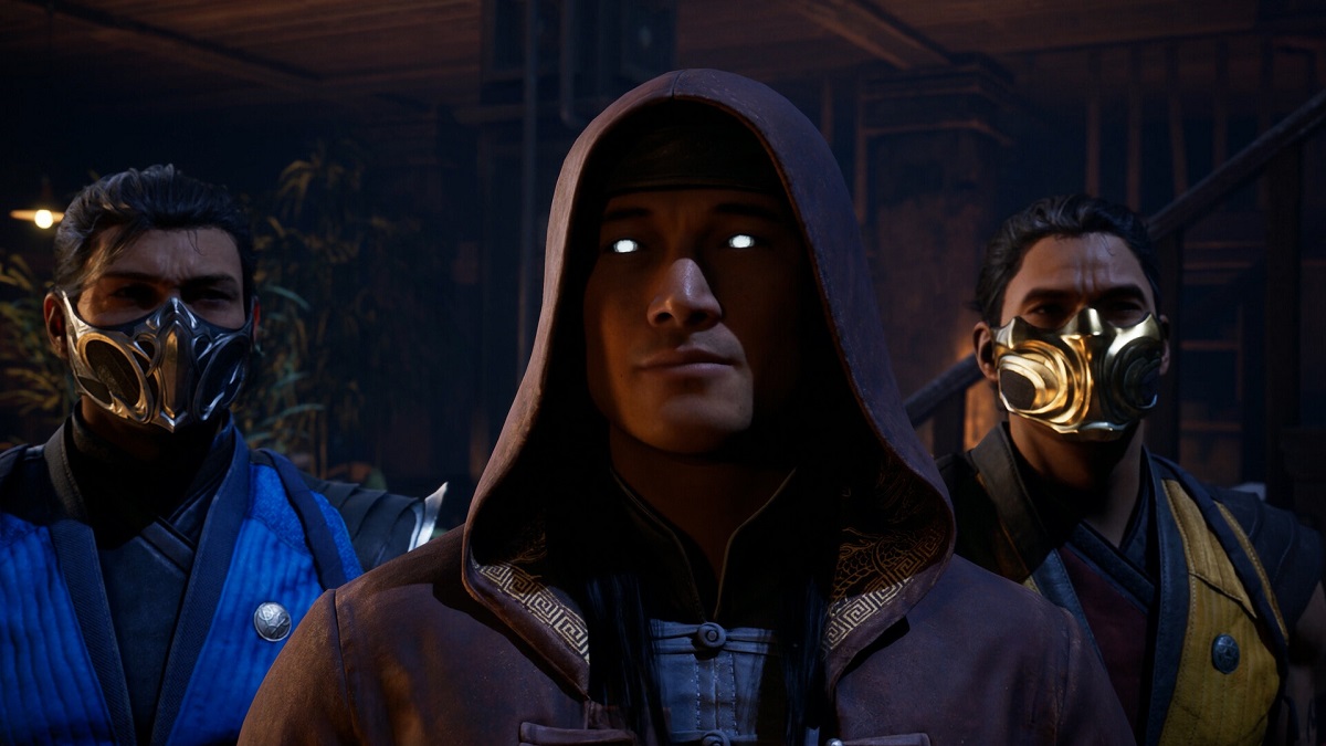 Mortal Kombat 1 - Liu Kang smiles with Sub-Zero and Scorpion standing at either side.