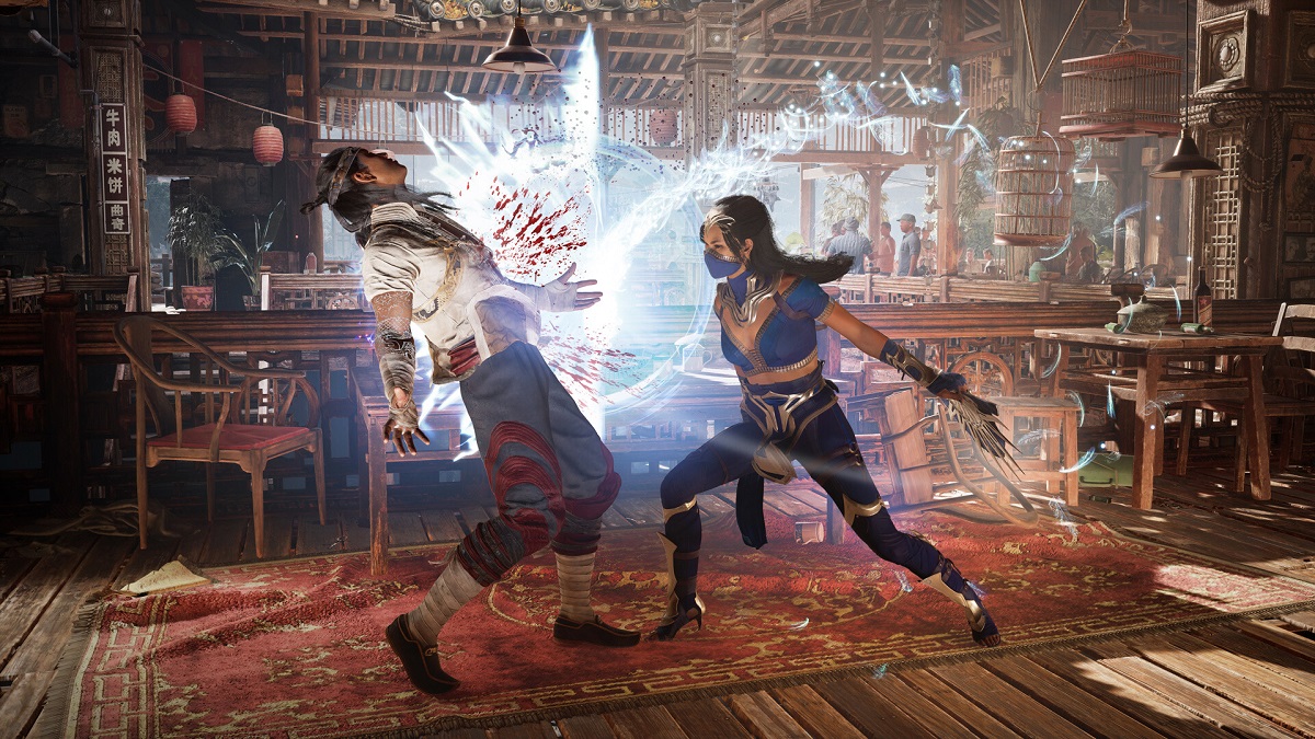 Mortal Kombat 1- Kitana cuts Liu Kang with a bladed fan