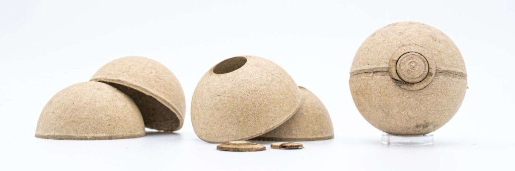 Poke Ball parts made from used cardboard fireworks shells