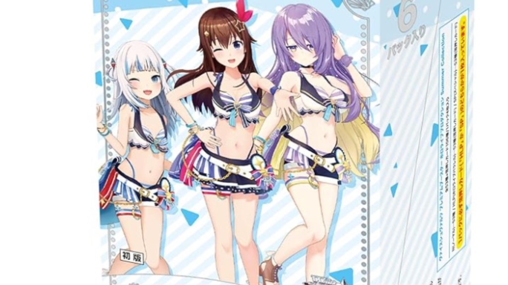 A card box with three anime girls on the packaging