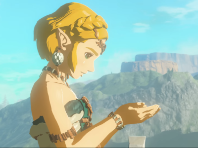 Image of Princess Zelda in Tears of the Kingdom looking at something in her hands