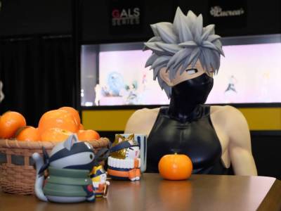 Life-Size Naruto Figure of Kakashi Sits at a Kotatsu