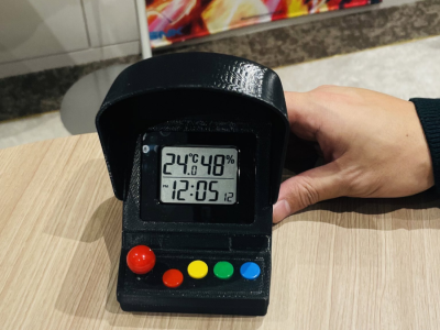 Neo Geo-shaped clock thermometer and hygrometer device will include SNK game BGMs like KOF 95