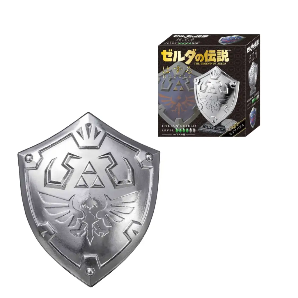 The two new Legend of Zelda Huzzle Puzzles feature Addison holding the Hudson Construction sign and the Hylian Shield.