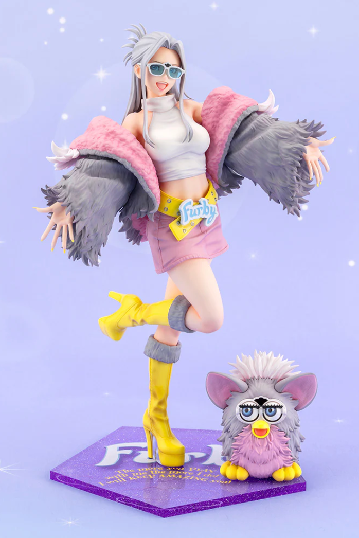 The next Kotobukiya Hasbro Bishoujo figure will reimagine Furby as a cute girl wearing a fur jacket with a Furby face on the back. 