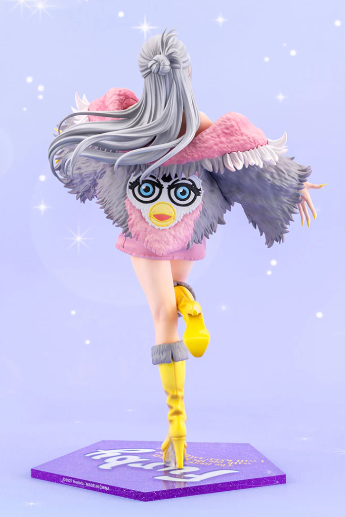 The next Kotobukiya Hasbro Bishoujo figure will reimagine Furby as a cute girl wearing a fur jacket with a Furby face on the back. 