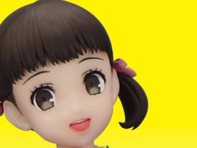 Persona 4 Revival Nanako Figure Holds a Teddie Plush